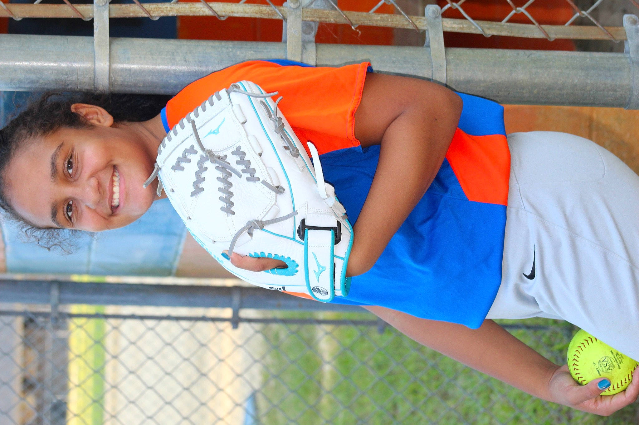 Domanique joined the competition — help win amazing prizes! elbow, electric_blue, fence, fun, grass, happy, jersey, joy, knee, leisure, orange, person, player, shorts, smile, sports_equipment, sports_gear, sports_uniform, sportswear, summer