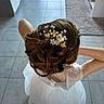 Yrina participe au concours pour gagner de l'argent avec cette photo : child, girl, updo_hair, hair_accessory, pearl, gold_leaf, white_dress, dress, tiled_floor, rug, indoor, back_view, hairstyle, person, elegant, decor, furniture, arm, shoulder, young