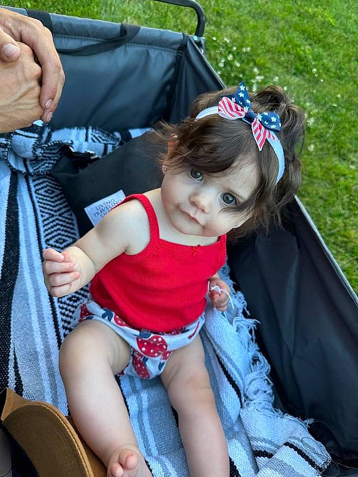 Payton joined the competition — help win amazing prizes! baby_toddler_clothing, blue, child, dress, electric_blue, event, fun, grass, hairstyle, happy, human_leg, leisure, people, person, pink, plant, recreation, sitting, summer, thigh