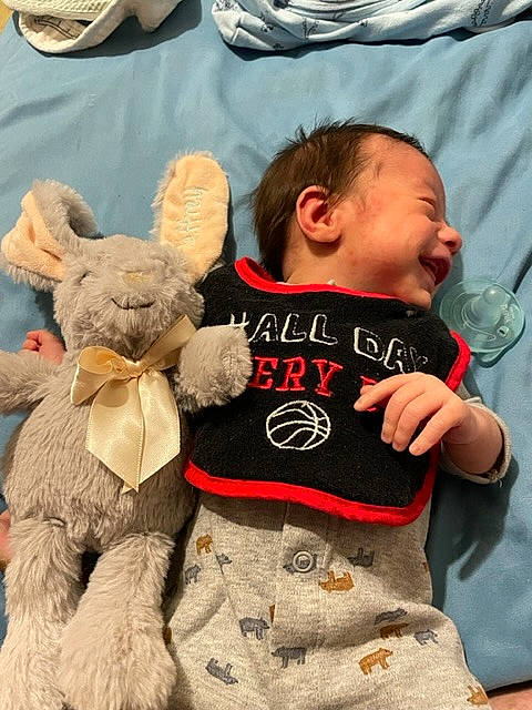 Jeffrey joined the competition — help win amazing prizes! baby, baby_sleeping, baby_toddler_clothing, child, event, fashion_accessory, fawn, fur, happy, linens, pattern, person, plush, sleeve, stuffed_toy, t_shirt, textile, toddler, toy, water_bottle