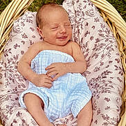 Oakley Mae joined the competition — help win amazing prizes! baby, newborn, basket, blanket, smiling, sleeping, infant, outdoor, grass, soft, cute, peaceful, wrapped, child, portrait, hands, feet, relaxed, cozy, nature