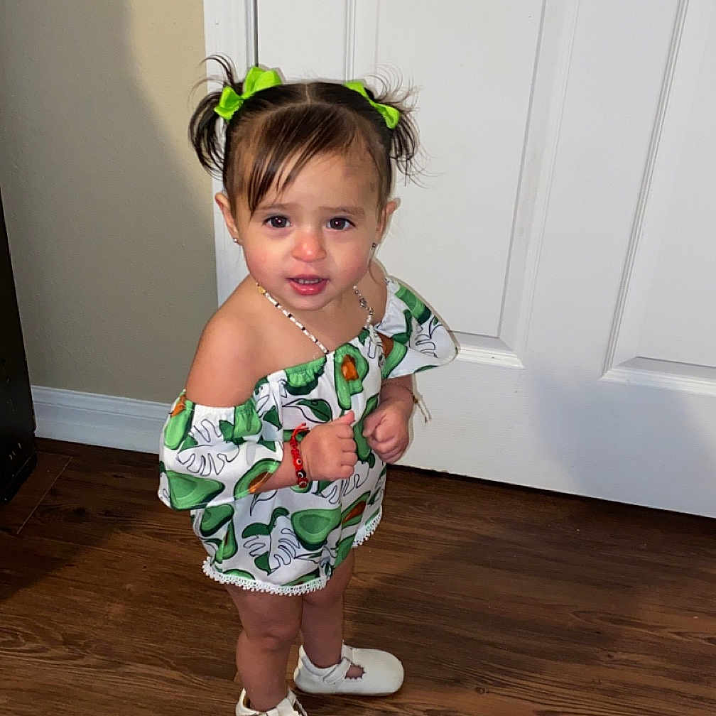 Mecha is registered to the contest to win money with this photo: accessories, child, clothing, door, dress, face, female, footwear, girl, hardwood, head, indoors, jewelry, necklace, person, photography, portrait, shoe, shorts, wood