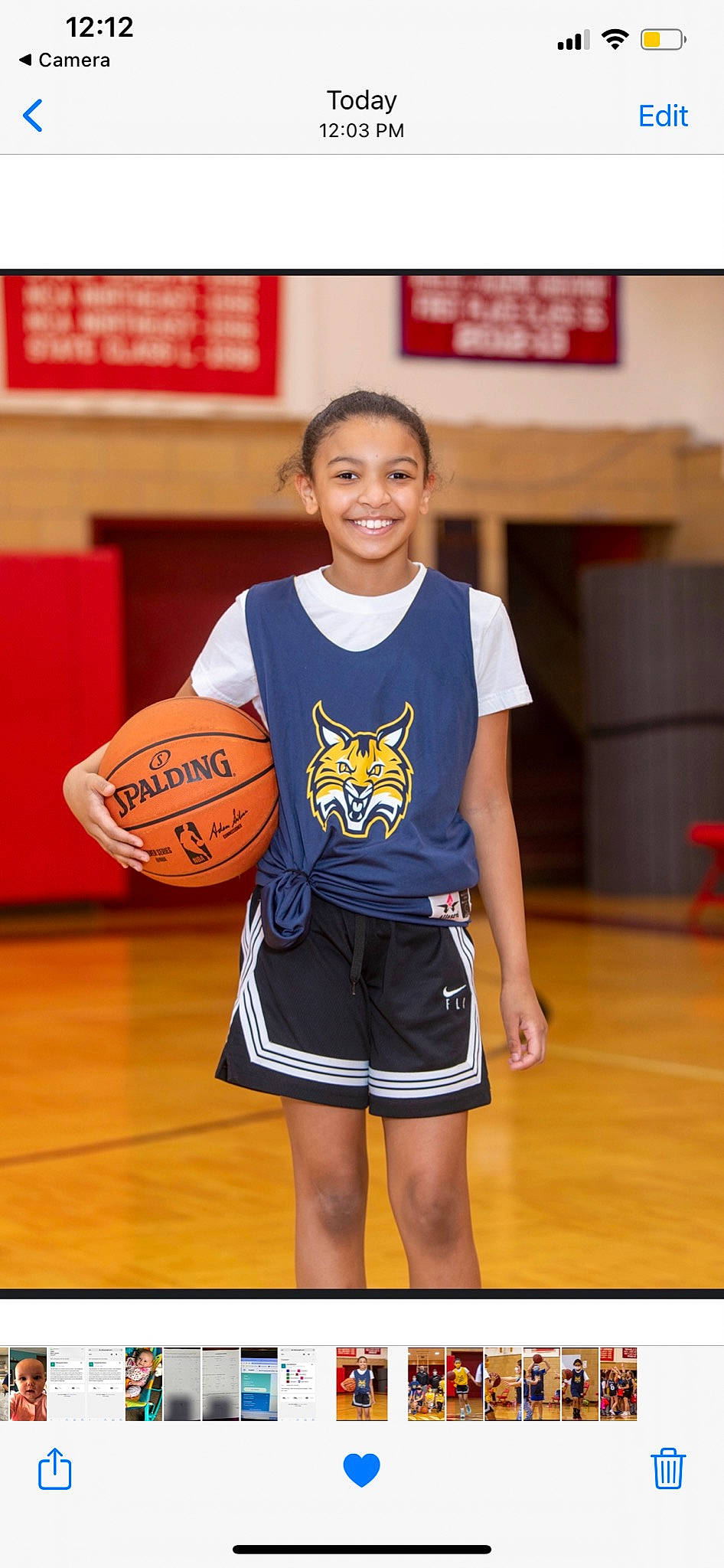 Kiana joined the competition — help win amazing prizes! active_shorts, ball, ball_game, competition_event, jersey, joy, knee, orange, person, player, shorts, sleeve, smile, sports, sports_equipment, sports_jersey, sports_uniform, sportswear, t_shirt, team_sport