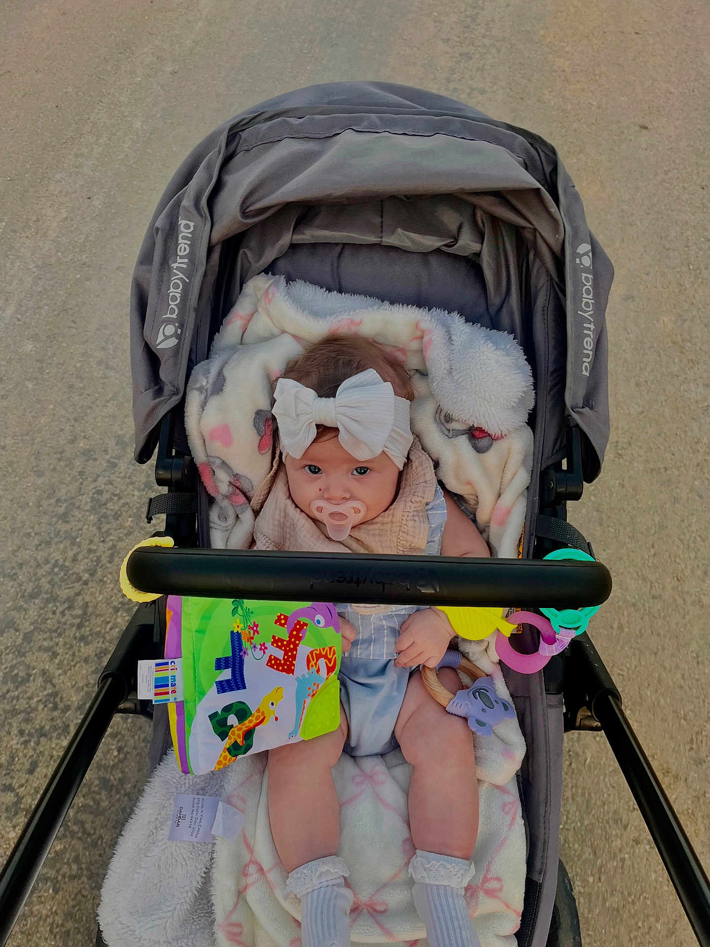 Sailor joined the competition — help win amazing prizes! baby, stroller, blanket, pacifier, headband, toy, baby_clothing, socks, outdoor, infant, cute, child, person, walking, seat, plaything, fabric, comfort, baby_toy, expression