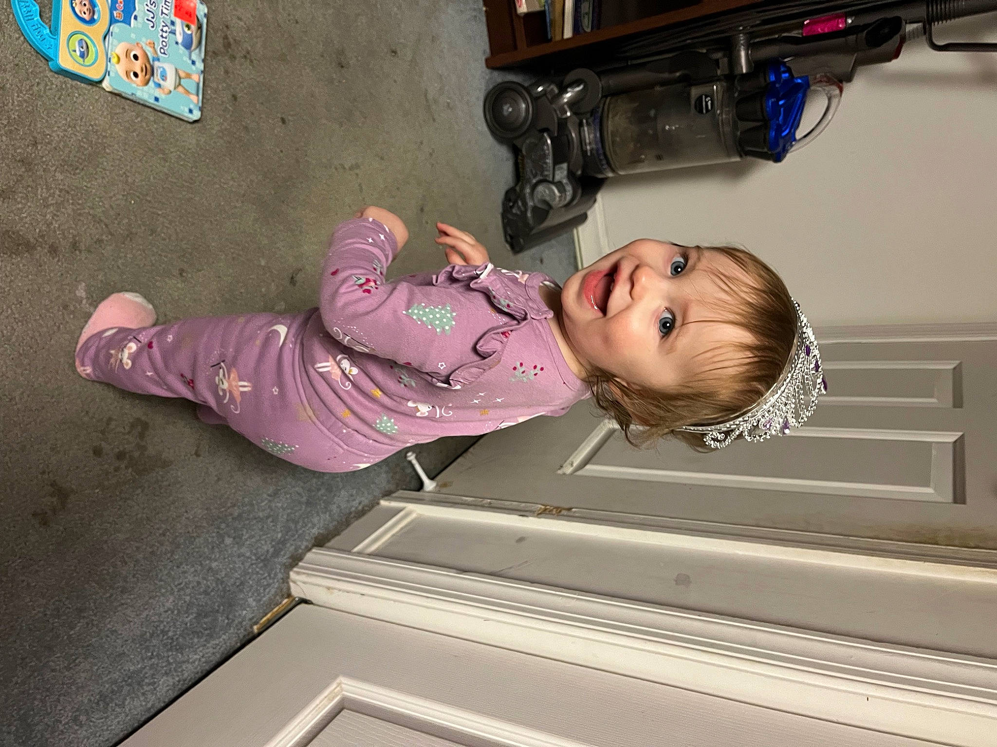 Kinsley is registered to the contest to win money with this photo: baby_toddler_clothing, child, fun, machine, magenta, person, room, smile, toddler, wood