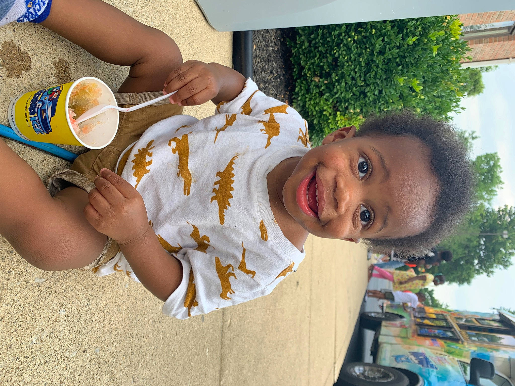 Ezra joined the competition — help win amazing prizes! child, drinking, food, fun, grass, happy, joy, leisure, people_in_nature, person, plant, play, smile, t_shirt, toddler, tree, vacation, water