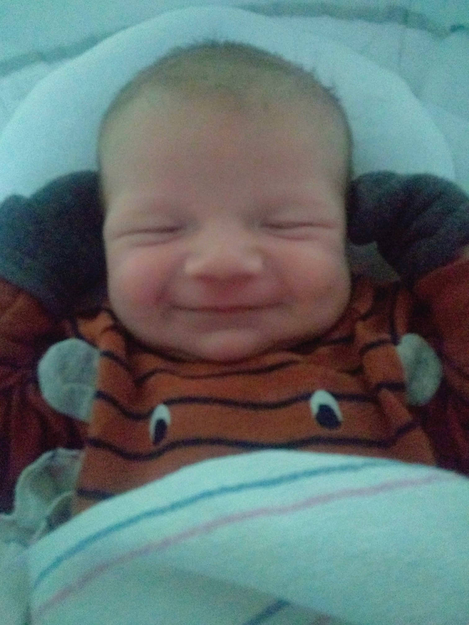 Colin Jr is registered to the contest to win money with this photo: baby, bedtime, birth, cheek, child, chin, eye, face, facial_expression, forehead, hand, head, lip, mouth, nap, nose, person, skin, sleep, smile