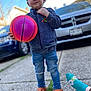 child, basketball, outdoor, sidewalk, footwear, jacket, jeans, crocs, toy, person, blue_sky, car, house, sock, grass, concrete, portrait, play, smile, young