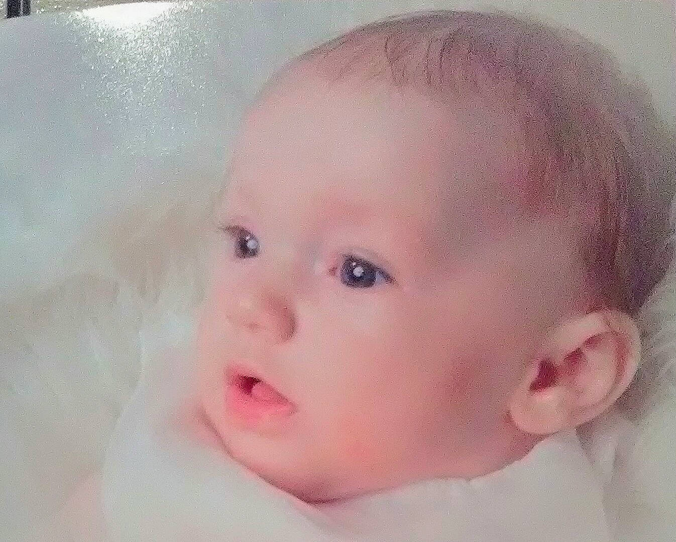 Raylynn is registered to the contest to win money with this photo: cheek, child, eye, face, head, infant, mouth, nose, organ, person, pink, skin, toddler