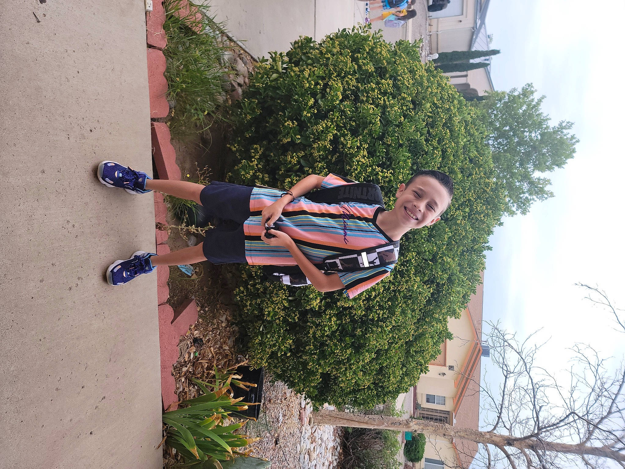 Adrian is registered to the contest to win money with this photo: arm, daytime, fun, grass, human_leg, joy, leisure, light, line, people_in_nature, person, photograph, plant, shadow, shrub, sky, smile, summer, tree, walking_shoe