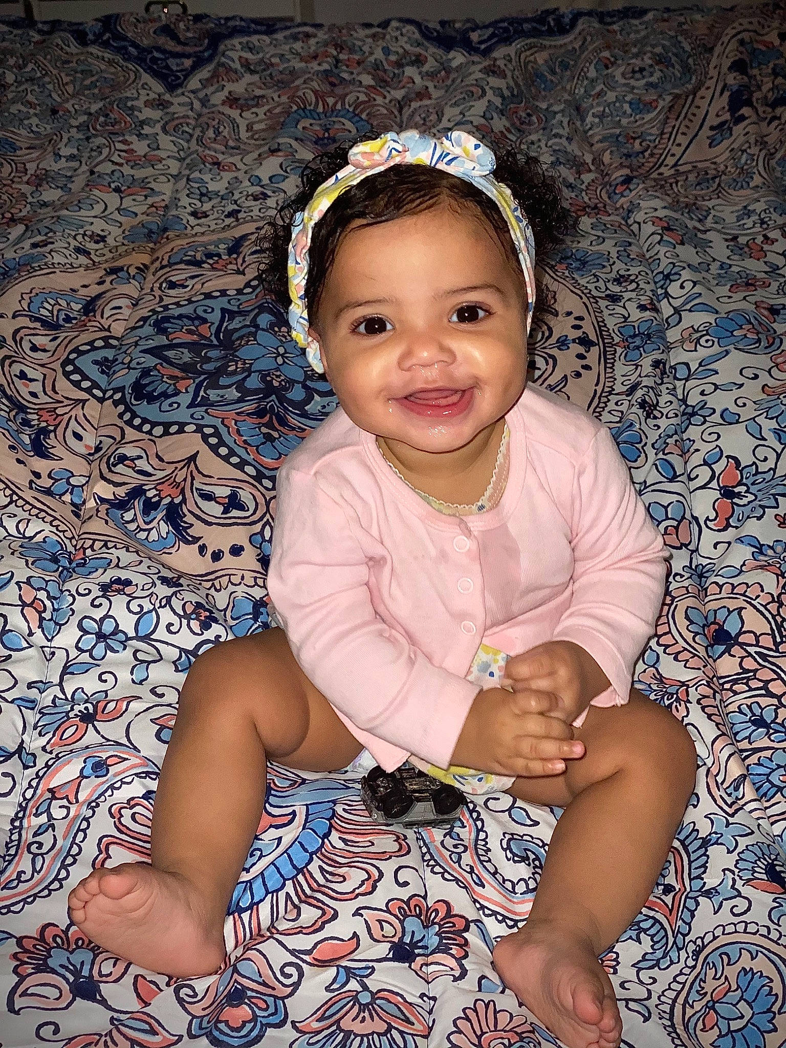 Kali is registered to the contest to win money with this photo: baby_toddler_clothing, child, dress, eye, flash_photography, foot, fun, grass, happy, head, headband, iris, joy, pattern, people_in_nature, person, purple, skin, sleeve, smile