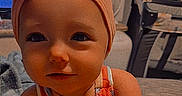 Hazley joined the competition — help win amazing prizes! baby, background, caption, child, cute, expression, face, furniture, headband, indoor, light, love, portrait, post, screenshot, sitting, skin, social_media, striped_clothing, toddler