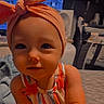 baby, background, caption, child, cute, expression, face, furniture, headband, indoor, light, love, portrait, post, screenshot, sitting, skin, social_media, striped_clothing, toddler