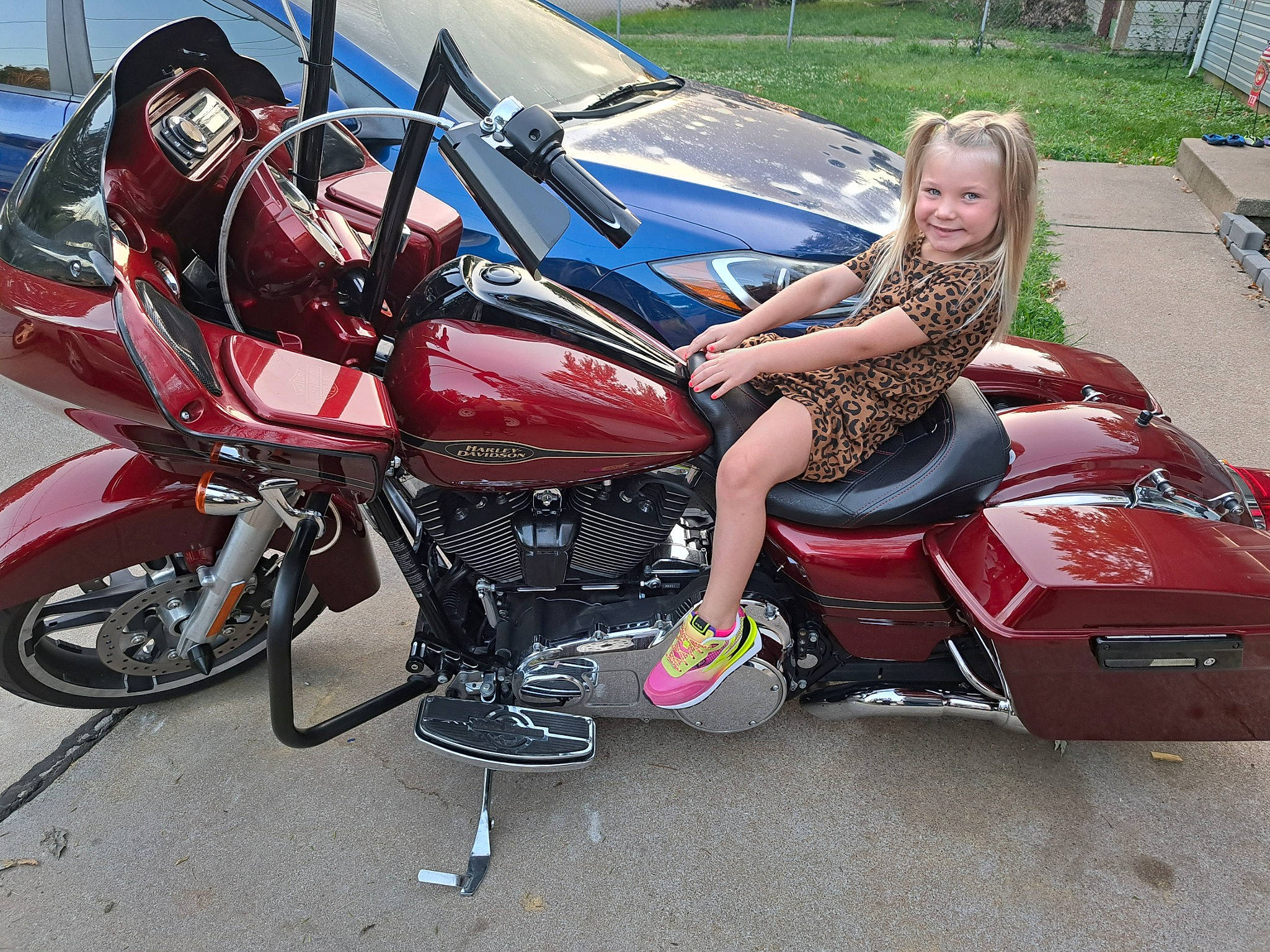 Makenzie is registered to the contest to win money with this photo: alloy_wheel, auto_part, automotive_design, automotive_exterior, automotive_lighting, automotive_tire, automotive_wheel_system, car, classic, fender, hood, joy, motor_vehicle, motorcycle_accessories, person, personal_luxury_car, rim, shorts, spoke, tire