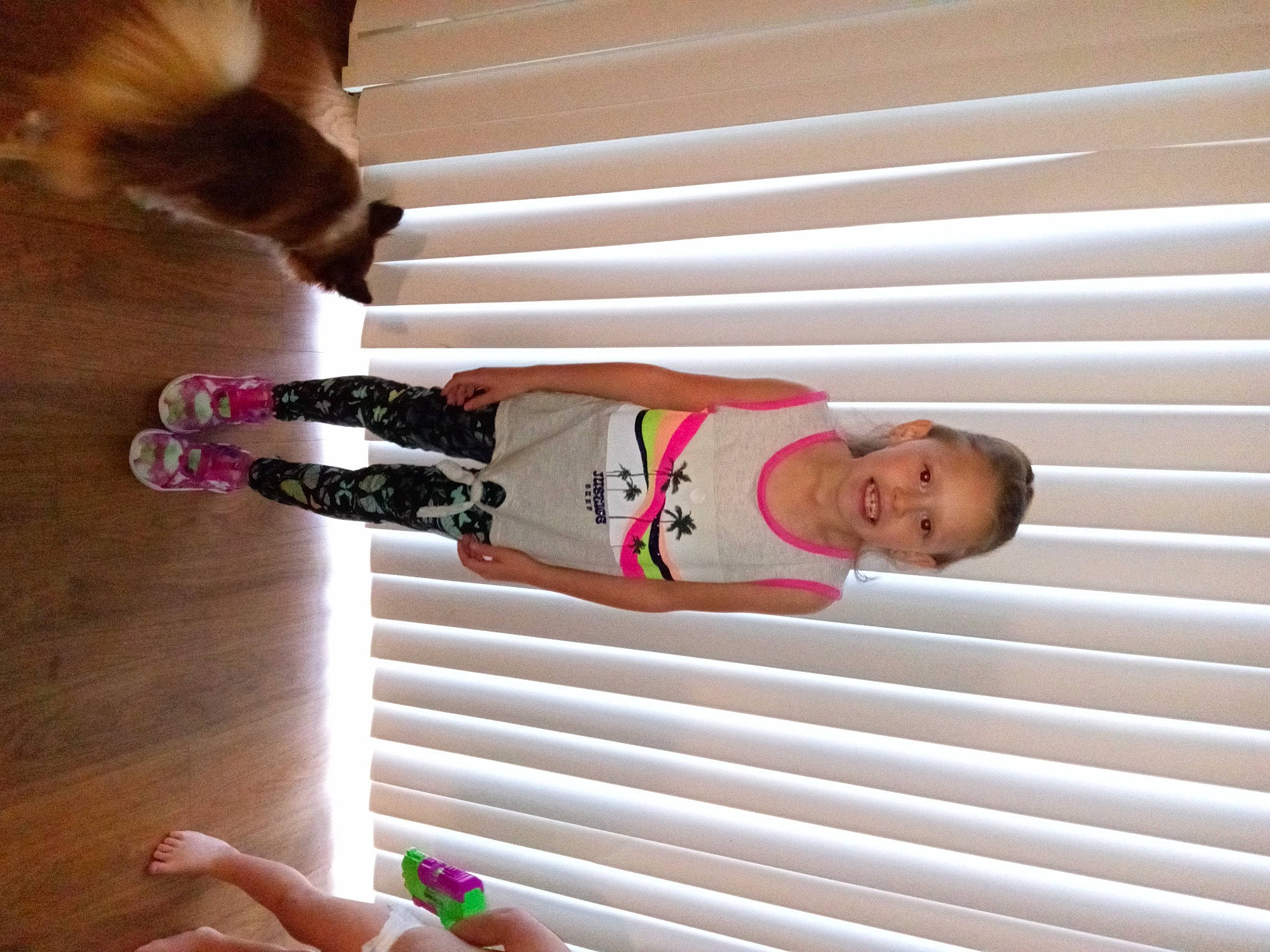 Raelynn joined the competition — help win amazing prizes! carmine, child, elbow, finger, flooring, fun, hardwood, human_leg, joy, knee, nail, person, red, room, shorts, sportswear, t_shirt, thigh, thumb, waist