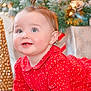 baby, child, red_dress, crawling, holiday, christmas_tree, golden_decoration, festive, smiling, indoors, cute, happy, portrait, face, skin, earrings, holiday_decor, background, celebration, toddler