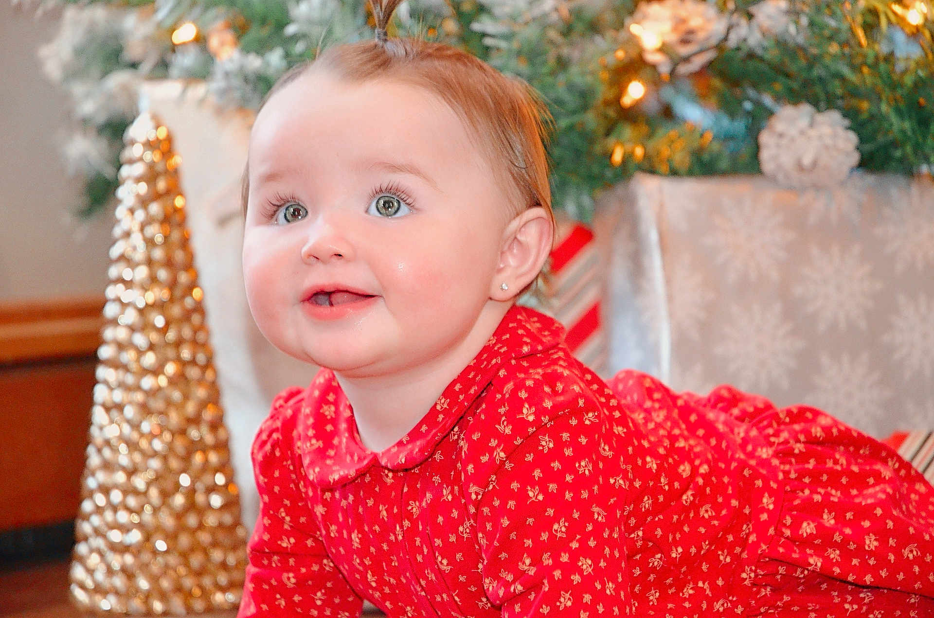 Alayna joined the competition — help win amazing prizes! baby, child, red_dress, crawling, holiday, christmas_tree, golden_decoration, festive, smiling, indoors, cute, happy, portrait, face, skin, earrings, holiday_decor, background, celebration, toddler