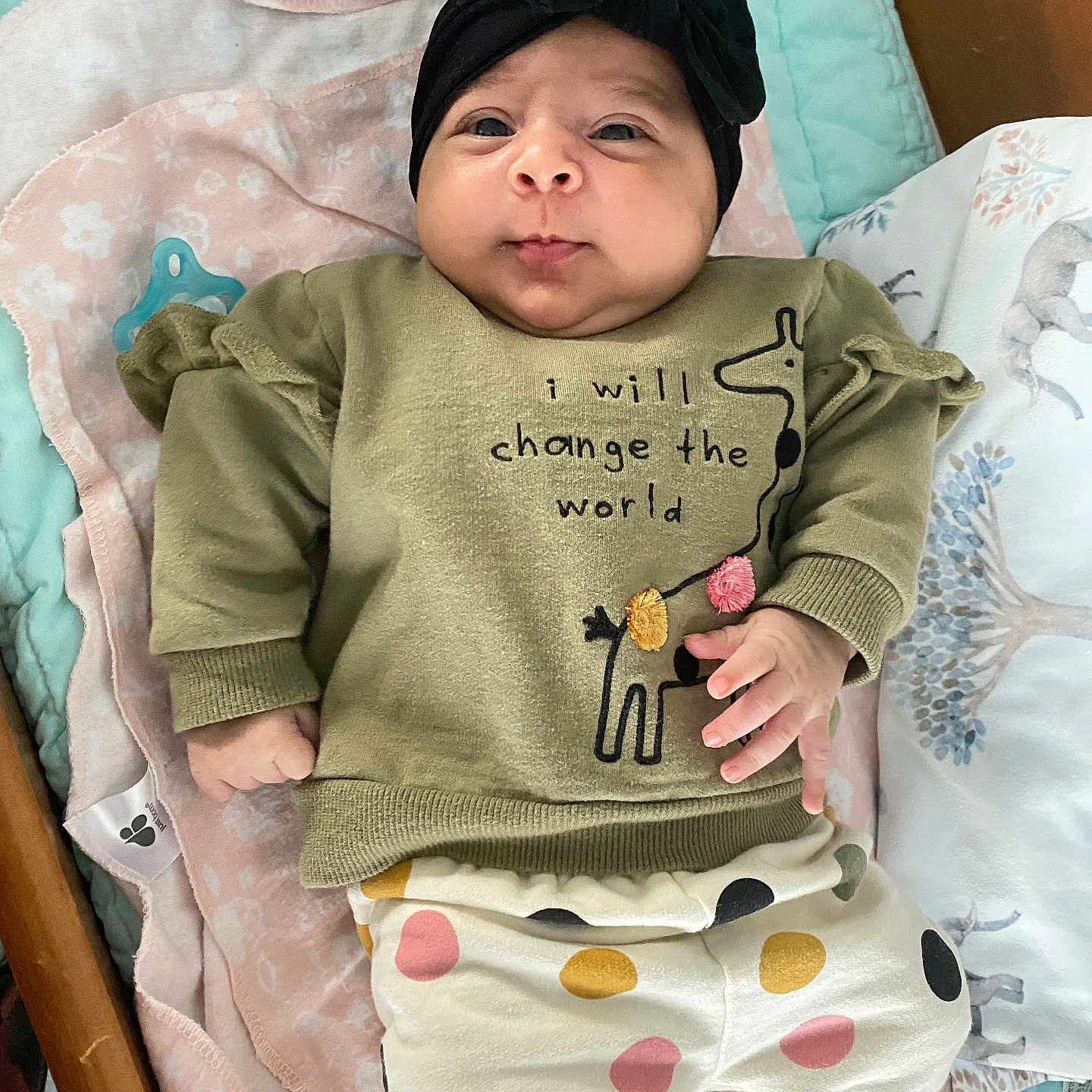 Aurelýa is registered to the contest to win money with this photo: applique, baby, bed, blackhair, blanket, clothing, crib, crying, face, furniture, hair, head, infantbed, pattern, person, photography, portrait, sad, sleeping, sleeve