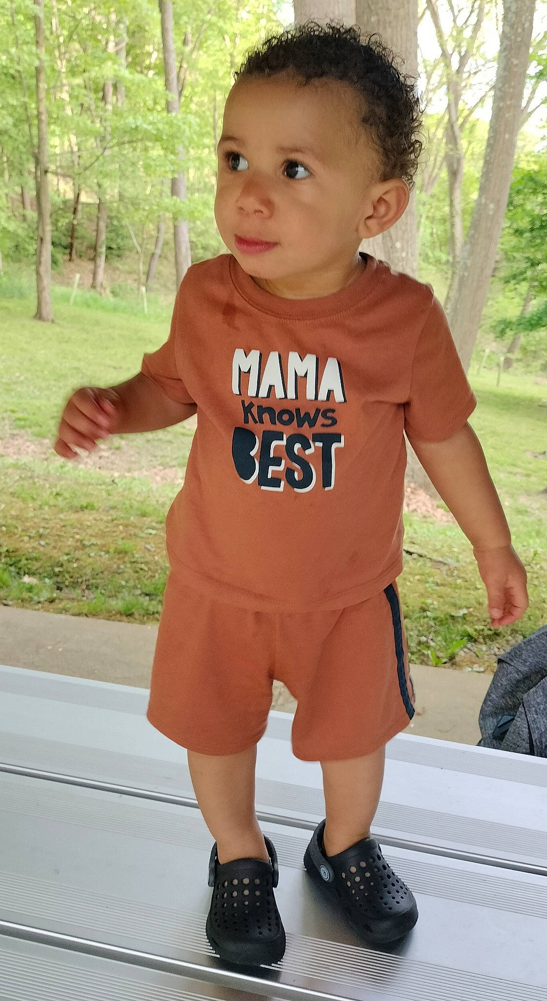 Daelyne is registered to the contest to win money with this photo: baby, baby_toddler_clothing, child, cool, face, fun, grass, happy, joint, leisure, neck, person, photograph, plant, shorts, shoulder, sleeve, summer, t_shirt, toddler