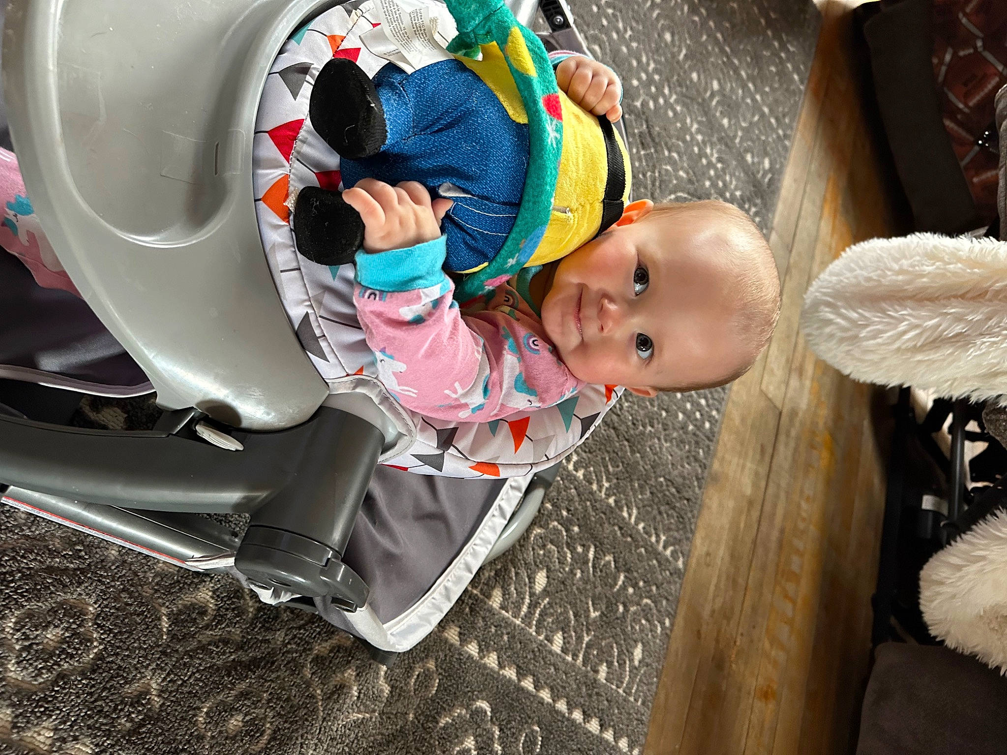 Luna is registered to the contest to win money with this photo: auto_part, automotive_design, automotive_exterior, automotive_tire, automotive_wheel_system, baby, baby_carriage, baby_products, baby_toddler_clothing, child, comfort, fender, fun, hat, leisure, motor_vehicle, person, personal_protective_equipment, tire, toddler