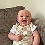 Cody is registered to the contest to win money with this photo: baby, smiling, infant, child, couch, clothing, happy, portrait, indoor, person, cute, sitting, furniture, face, skin, head, eyes, mouth, hand, apparel