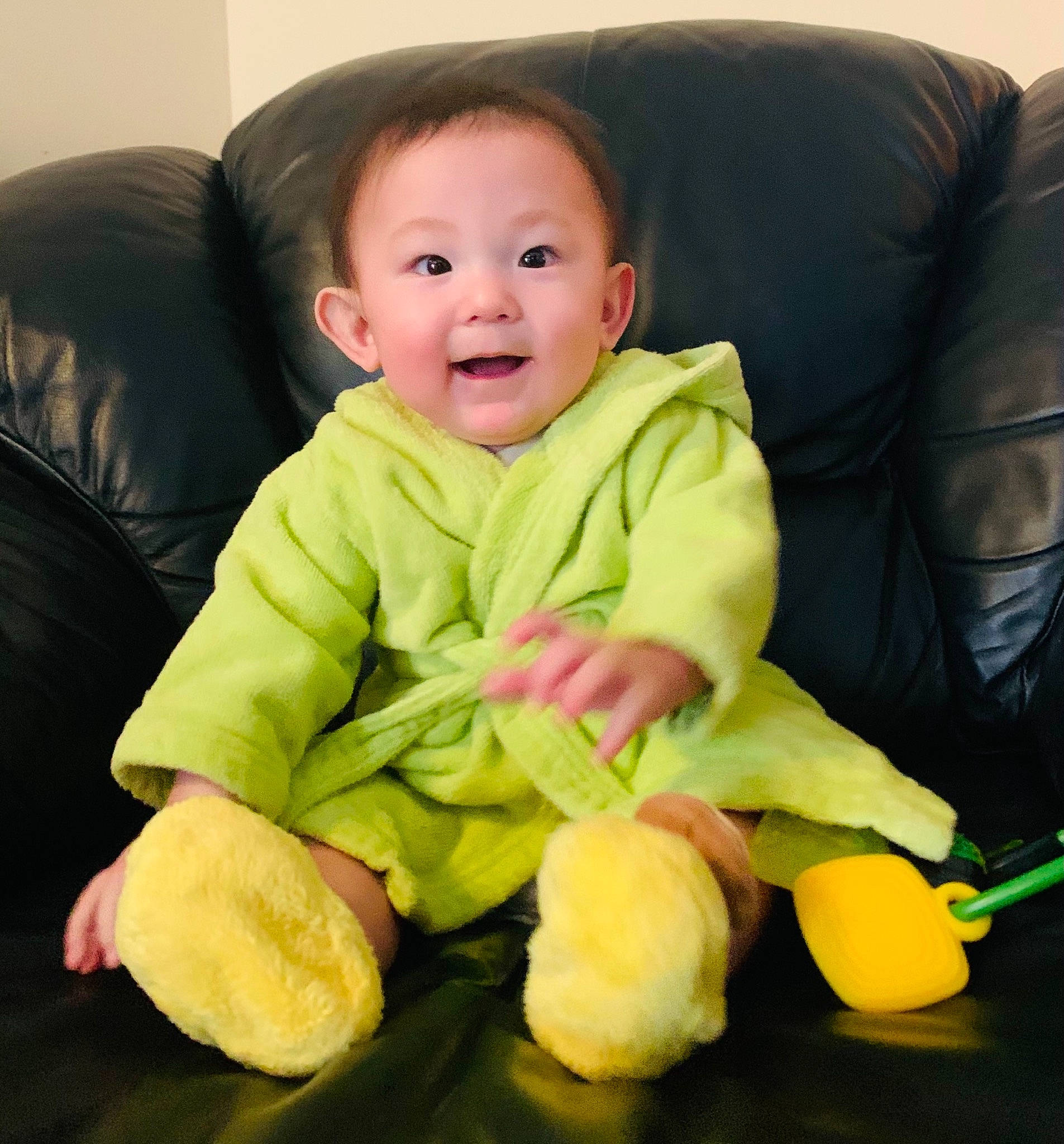 Abraham is registered to the contest to win money with this photo: baby, baby_products, baby_toddler_clothing, cheek, child, comfort, couch, eye, finger, fun, happy, iris, nose, person, product, sitting, sleeve, smile, thumb, toddler