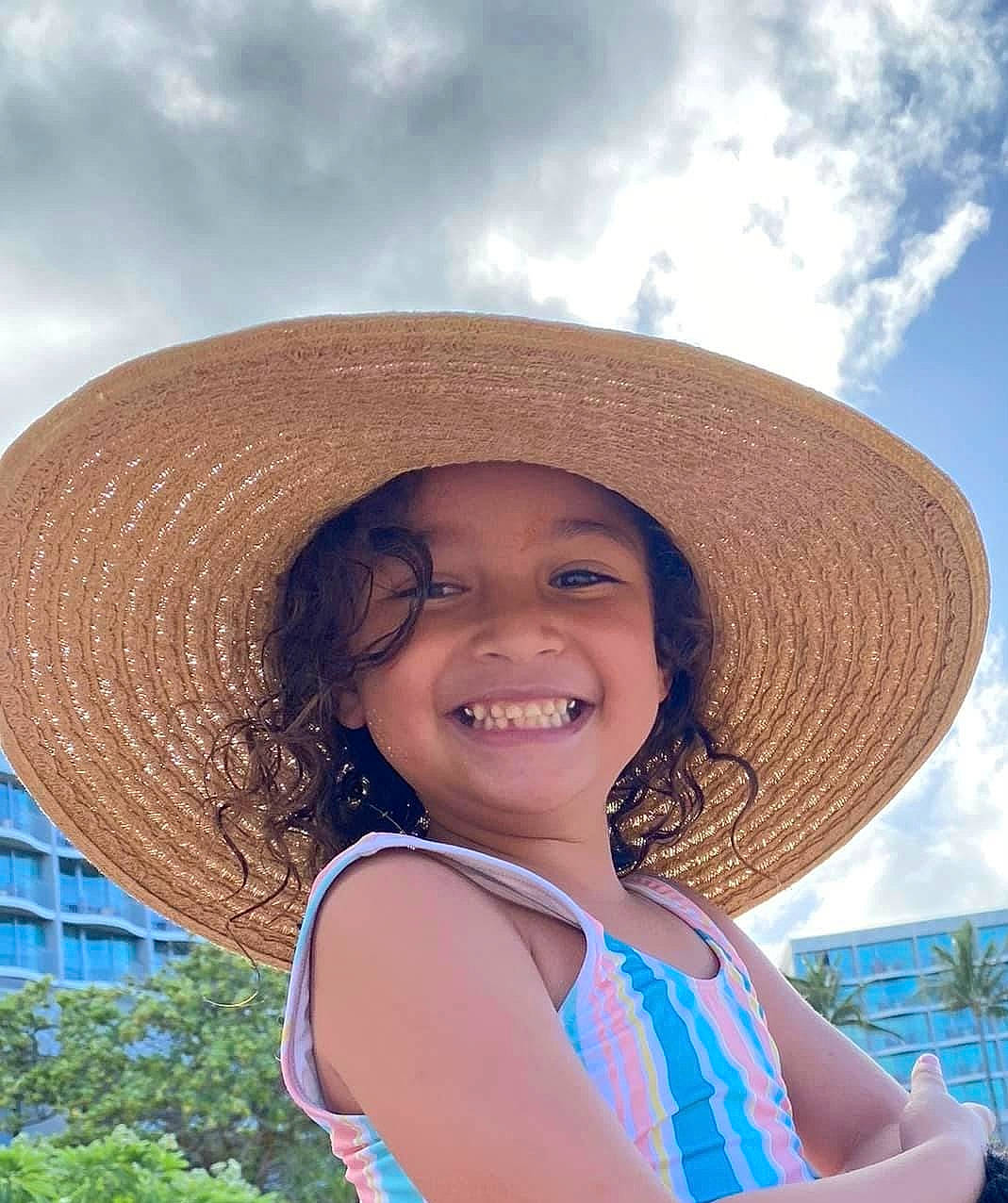 Kaydence is registered to the contest to win money with this photo: azure, blue, chin, cloud, facial_expression, fun, hair, hairstyle, happy, hat, headwear, human_body, joy, mammal, neck, people_in_nature, person, skin, sky, smile