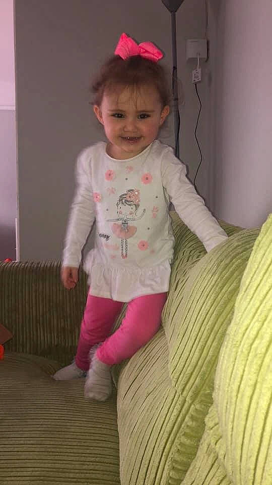 Emily joined the competition — help win amazing prizes! baby, baby_toddler_clothing, cheek, child, joy, outerwear, person, pink, skin, sleeve, smile, standing, sweater, toddler