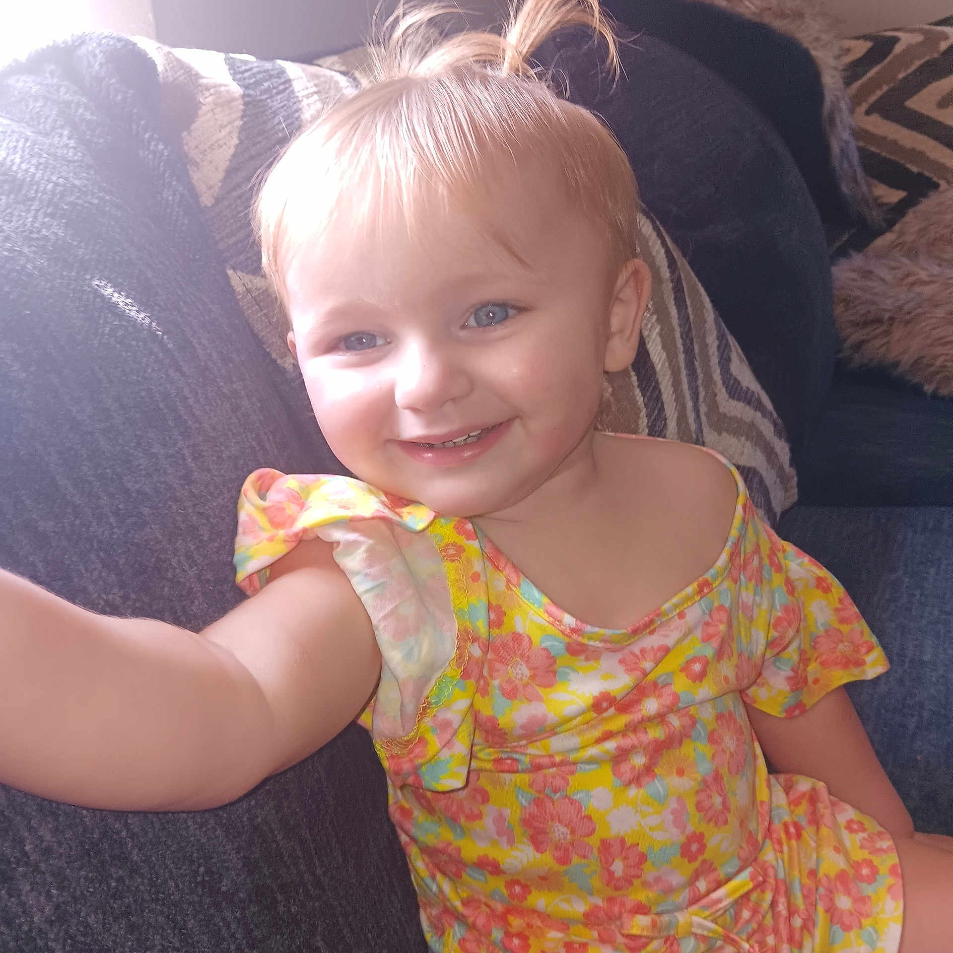 Lariah Ronda Dennis joined the competition — help win amazing prizes! baby, blonde, bodypart, clothing, couch, cushion, dress, face, finger, furniture, hair, hand, happy, head, homedecor, person, photography, portrait, sitting, smile