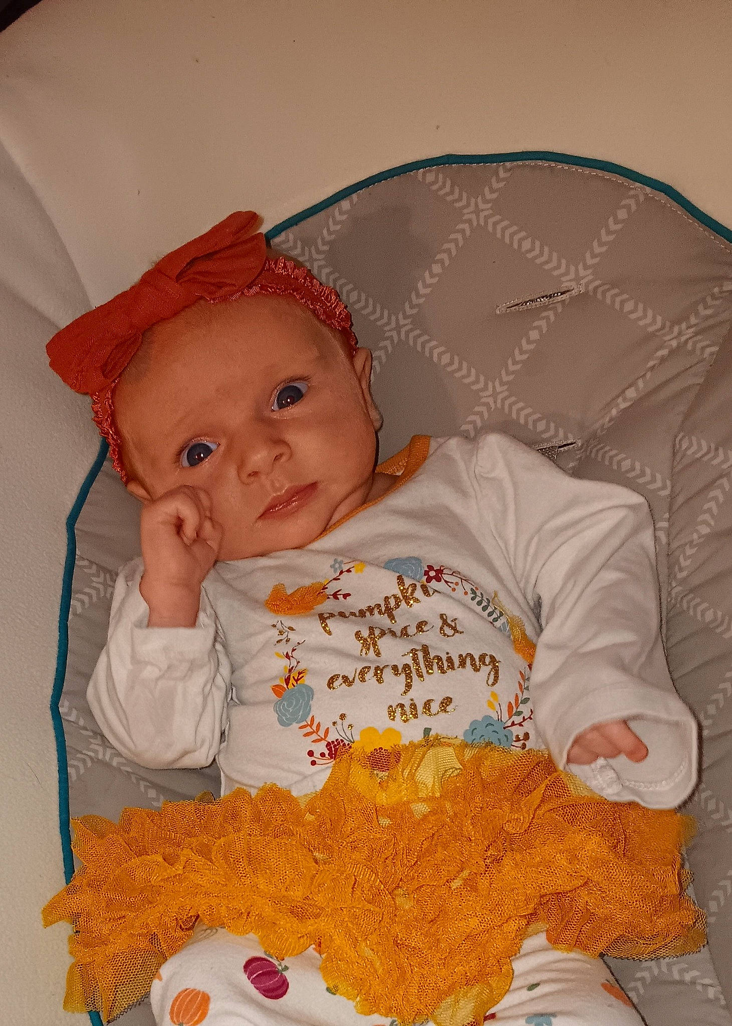 Lariah Rhonda Dennis joined the competition — help win amazing prizes! baby, baby_products, baby_safety, baby_sleeping, baby_toddler_clothing, chair, cheek, child, comfort, eye, linens, orange, pattern, peach, person, room, sitting, sleeve, textile, toddler
