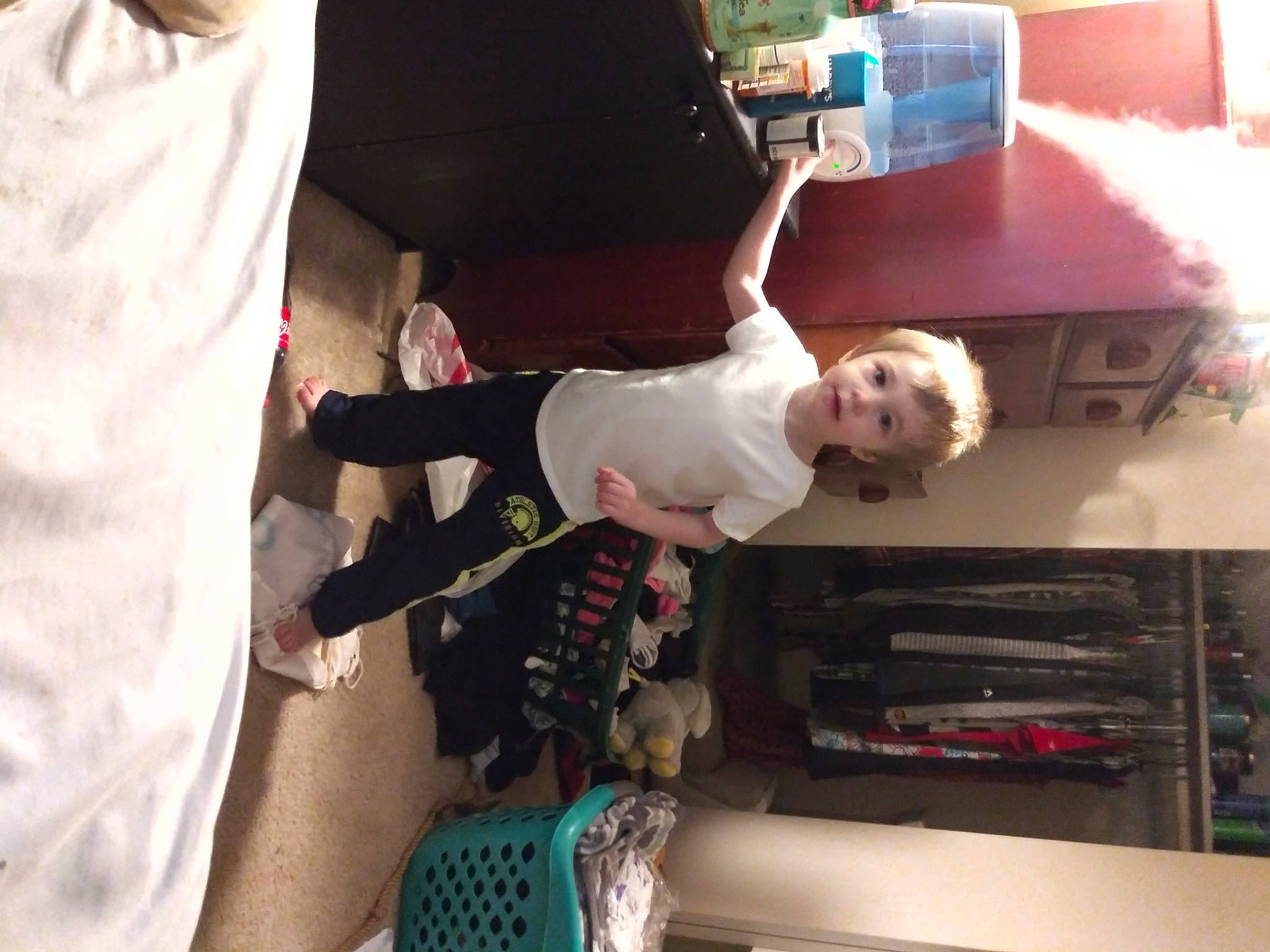 Daniel is registered to the contest to win money with this photo: baby, child, elbow, event, fun, gesture, happy, person, room, sleeve, smile, t_shirt, toddler