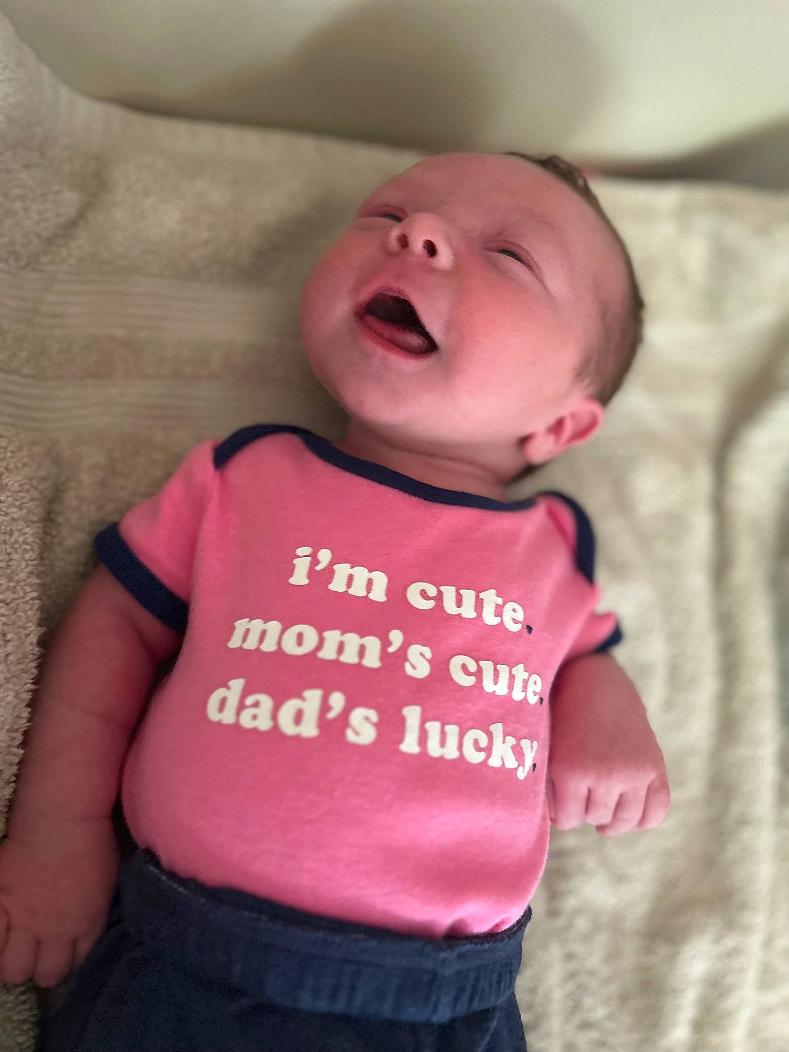 Laura joined the competition — help win amazing prizes! baby, baby_products, baby_toddler_clothing, cheek, clothing, happy, head, headgear, hood, human_body, linens, magenta, neck, outerwear, person, pink, sleeve, smile, t_shirt, textile