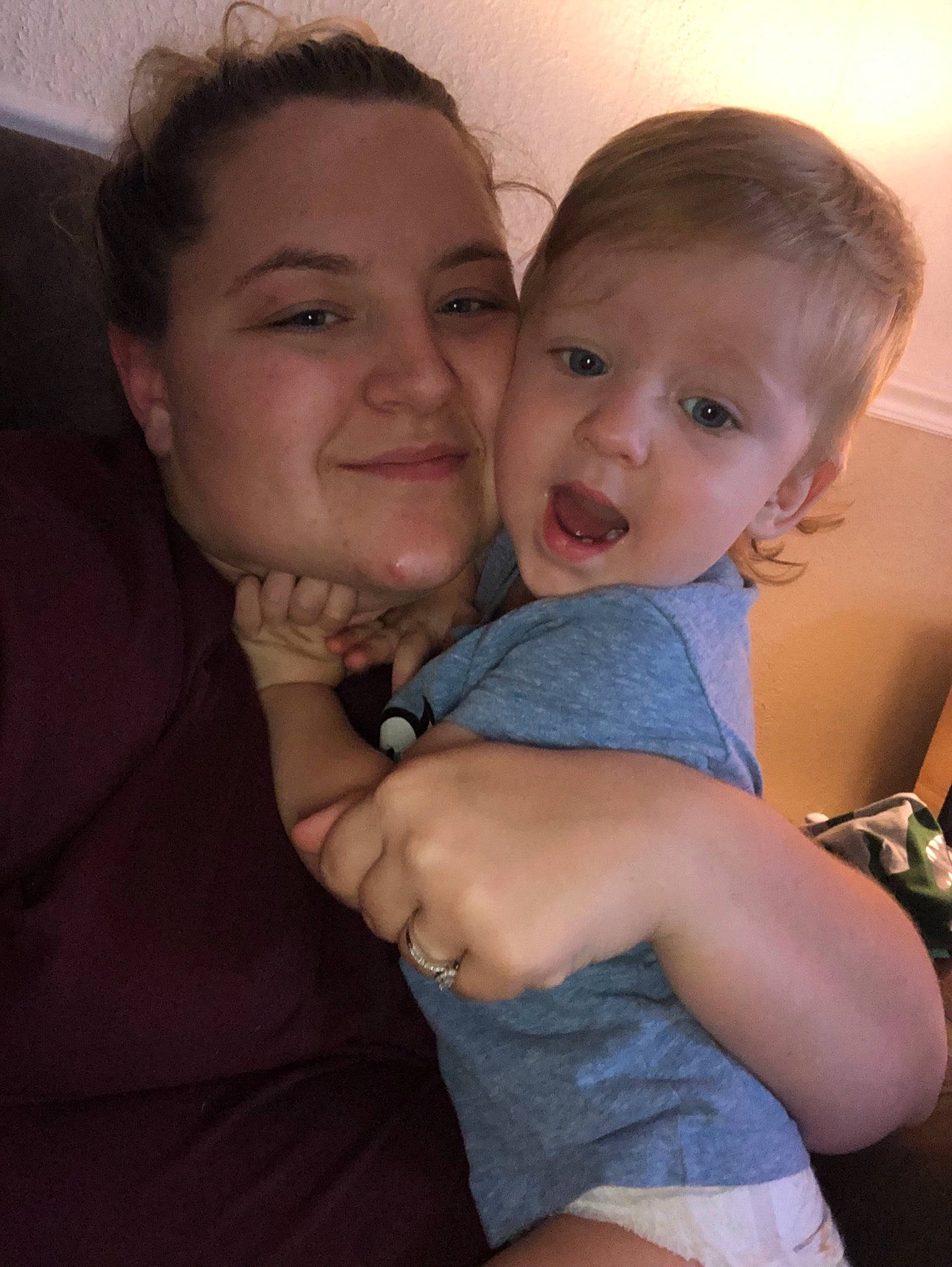 Hagen is registered to the contest to win money with this photo: arm, cheek, child, eye, face, finger, forehead, fun, gesture, head, hug, interaction, mother, mouth, muscle, nose, person, skin, smile, surprise