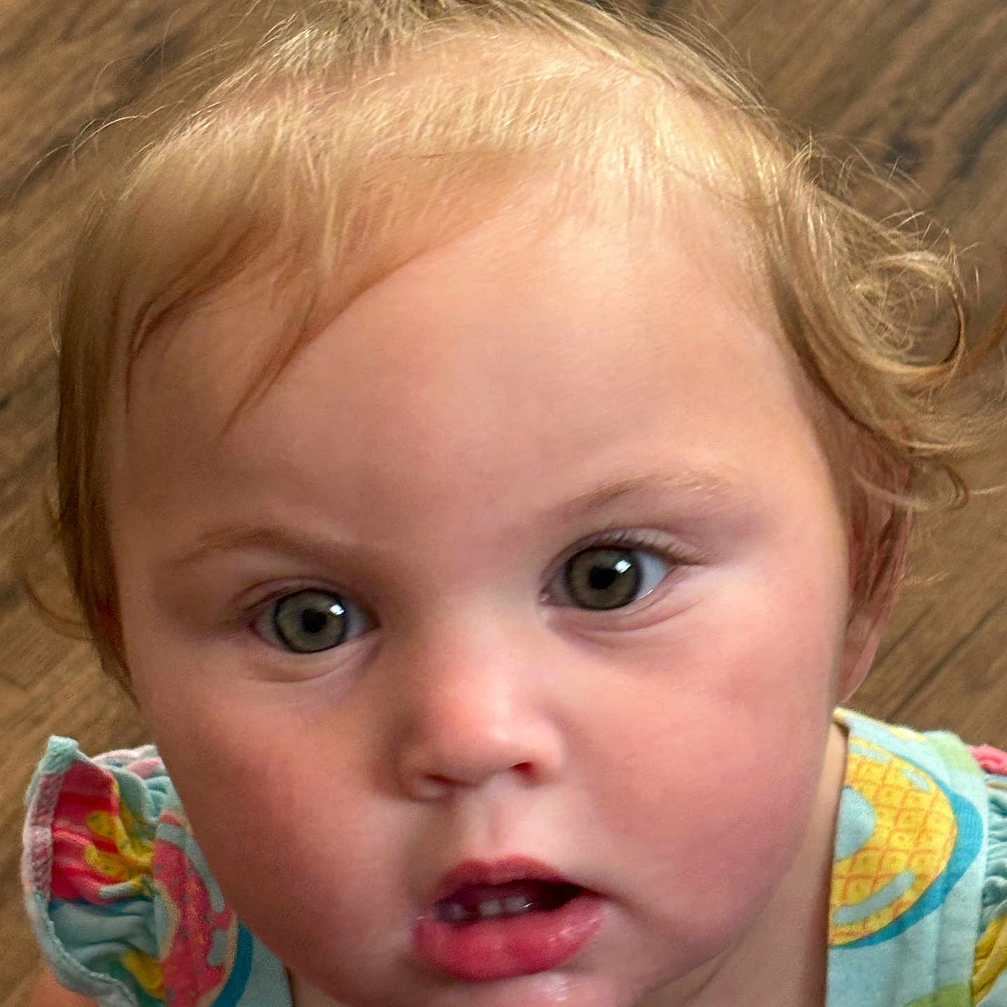 Mariah is registered to the contest to win money with this photo: accessories, baby, blonde, bodypart, earring, face, finger, frown, hair, hand, hardwood, head, jewelry, mouth, person, photography, portrait, sad, selfie, wood