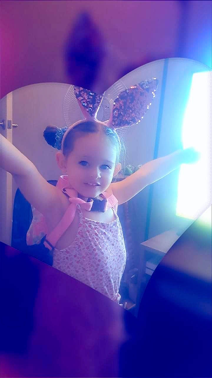 Evelynn is registered to the contest to win money with this photo: azure, baby, baby_toddler_clothing, child, electric_blue, event, fashion_design, flash_photography, formal_wear, fun, hand, happy, headpiece, insect, joy, magenta, mythical_creature, person, pink, purple