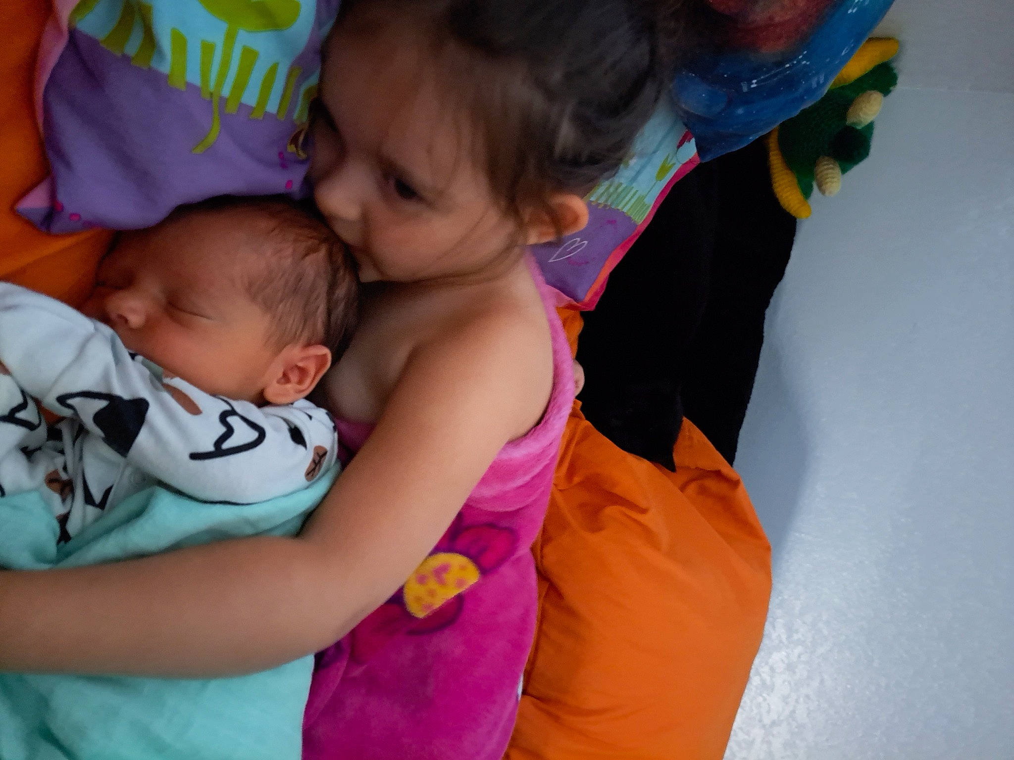 Evelynn joined the competition — help win amazing prizes! baby, baby_products, baby_toddler_clothing, child, event, family, finger, fun, grass, happy, hug, leisure, person, pink, play, recreation, sitting, skin, t_shirt, toddler