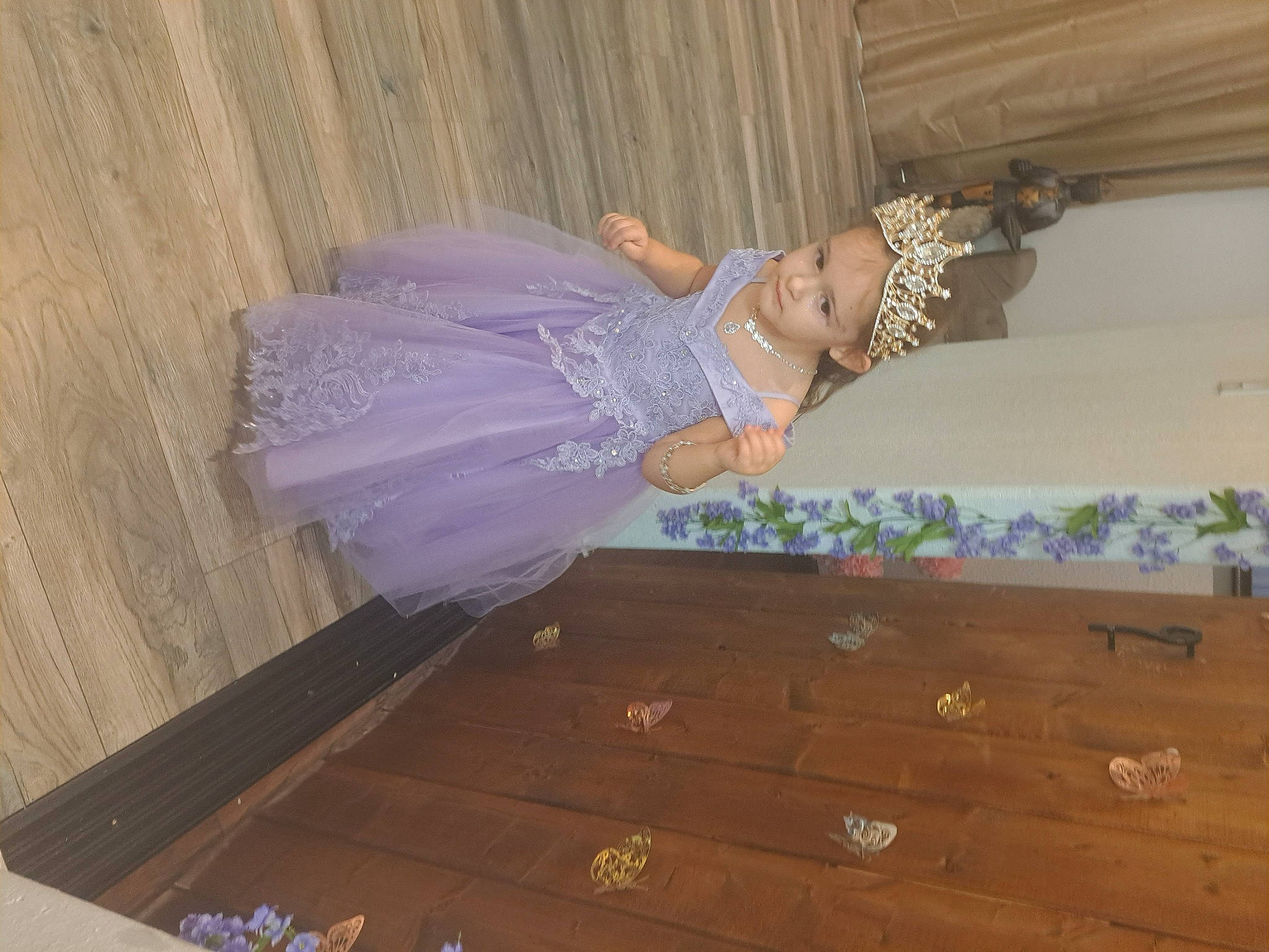 Evelynn is registered to the contest to win money with this photo: bridal_accessory, day_dress, dress, embellishment, event, fashion_design, flooring, formal_wear, fun, hardwood, headwear, magenta, one_piece_garment, pattern, peach, person, purple, varnish, waist, wood