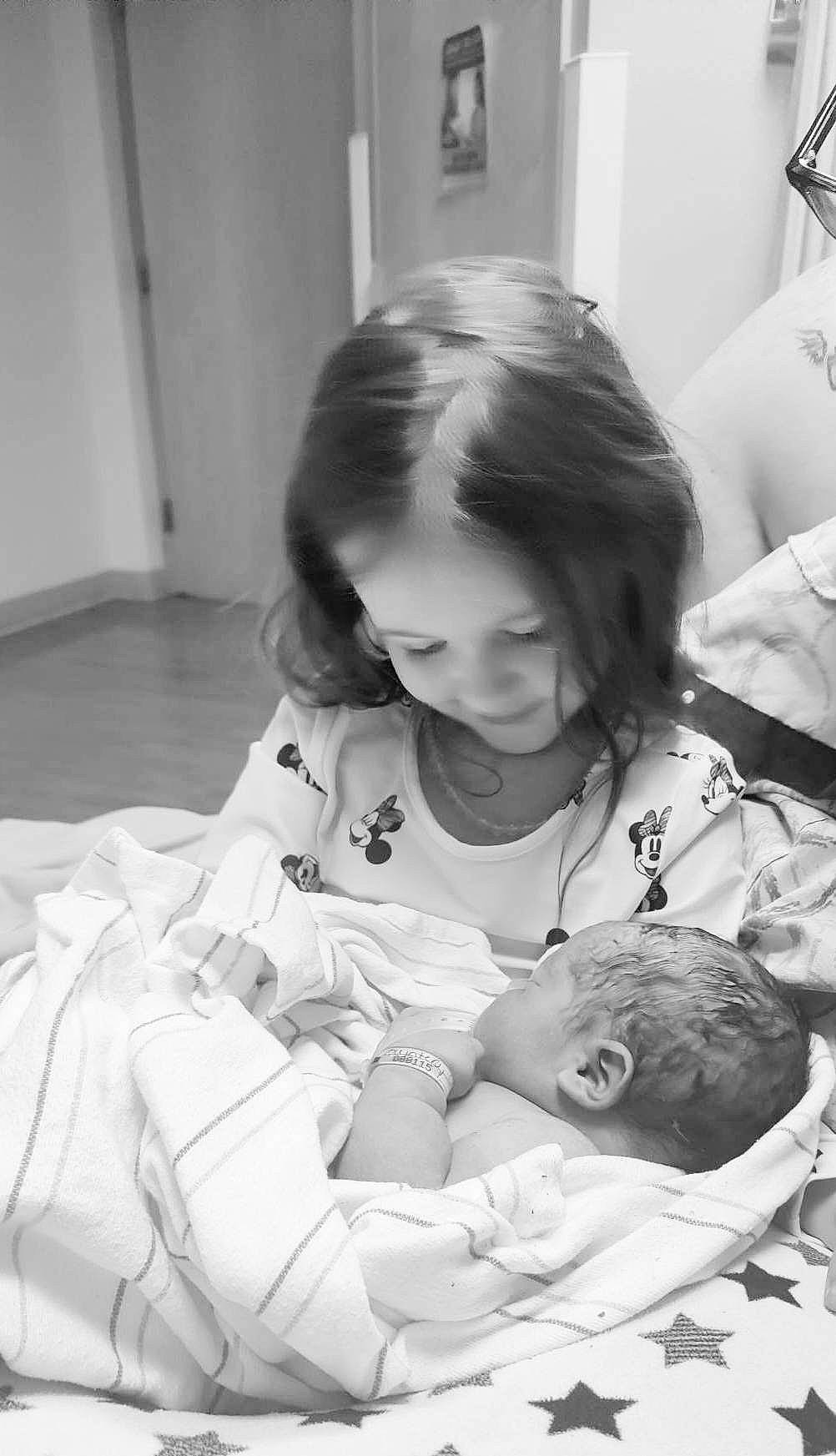 Elton is registered to the contest to win money with this photo: baby, beauty, black, black_and_white, child, comfort, eye, face, facial_expression, gesture, happy, monochrome, monochrome_photography, people, person, skin, smile, snapshot, style, toddler