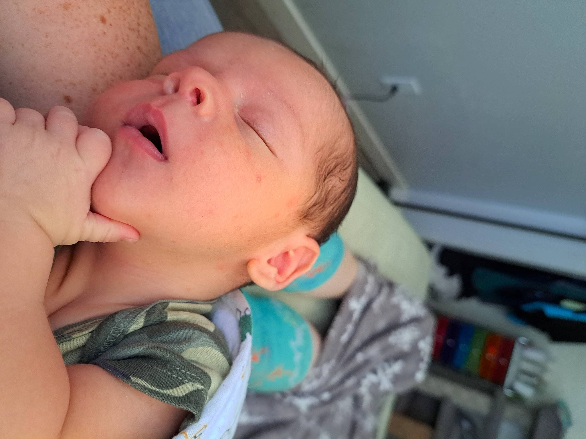 Elton is registered to the contest to win money with this photo: baby, baby_toddler_clothing, cheek, comfort, ear, eyelash, finger, gesture, hand, happy, human_body, iris, jaw, lip, mouth, neck, nose, person, skin, thumb