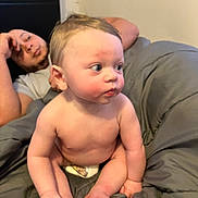 Castiel Lopez-Torres is registered to the contest to win money with this photo: baby, bed, bedroom, blanket, bodypart, couch, cushion, face, finger, furniture, hand, happy, head, homedecor, indoors, newborn, person, photography, portrait, room