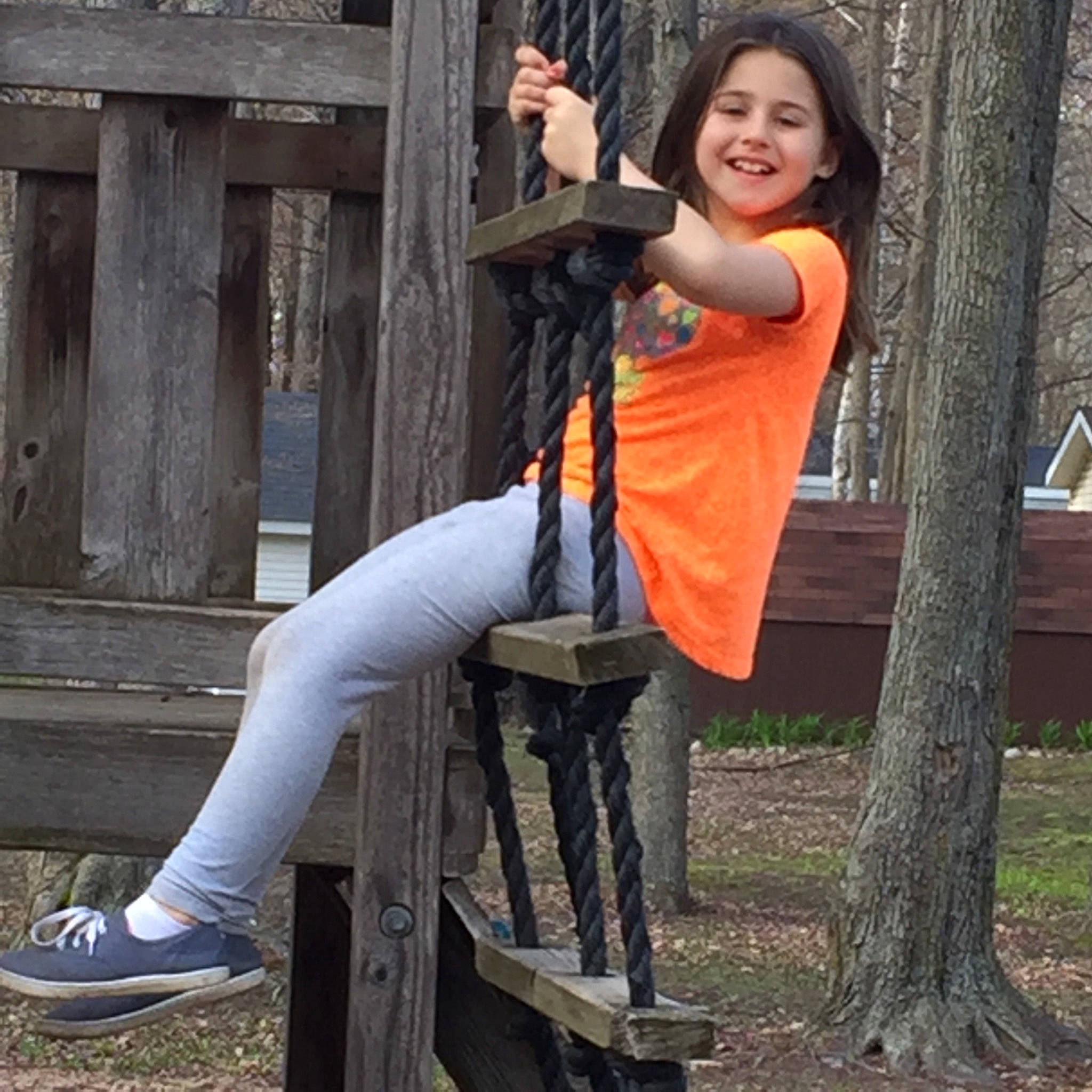 Kali is registered to the contest to win money with this photo: jeans, joy, lady, leg, long_hair, person, photo_shoot, photography, plant, sitting, tree, trousers