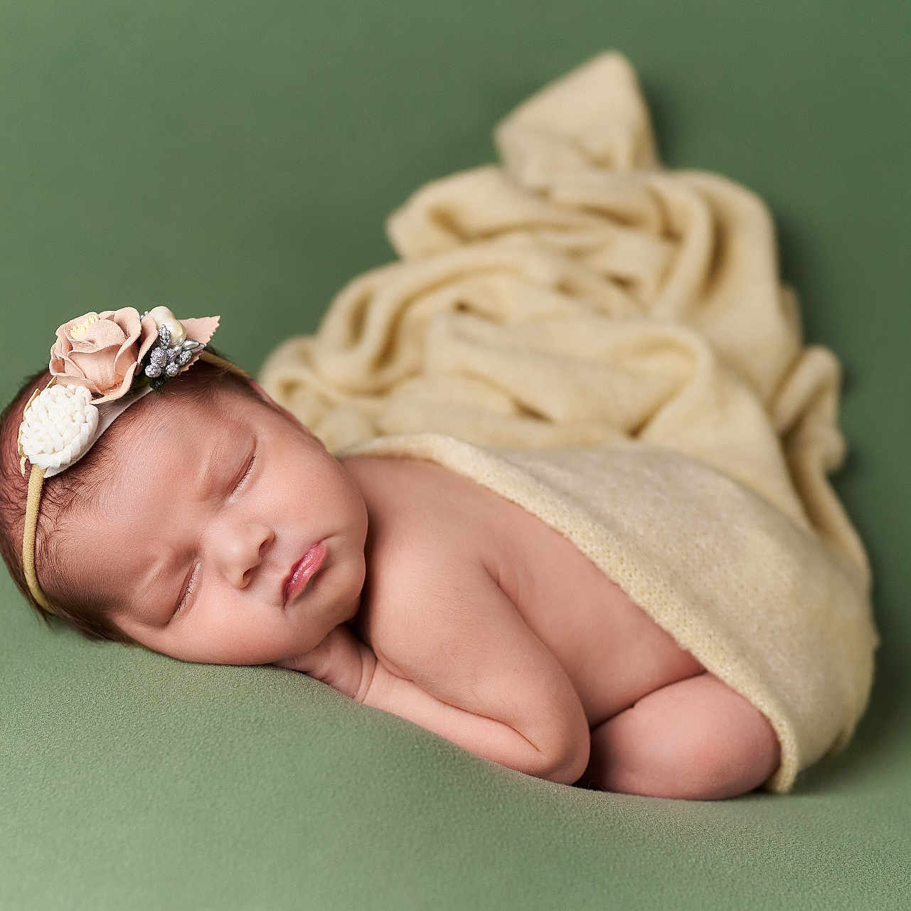 Lilia is registered to the contest to win money with this photo: baby, blanket, bodypart, bonnet, cap, clothing, face, finger, glove, hand, happy, hat, head, newborn, person, photography, portrait, sleeping, smile, towel
