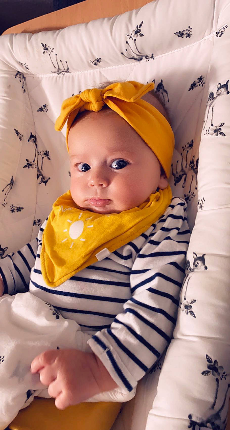 Lya participe au concours pour gagner de l'argent avec cette photo : baby, baby_products, baby_safety, baby_sleeping, baby_toddler_clothing, cheek, child, comfort, eye, face, facial_expression, finger, happy, head, headwear, linens, pattern, person, skin, sleeve