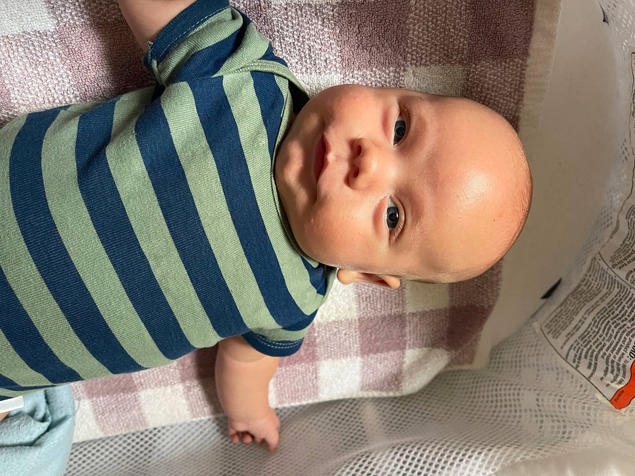 Layne is registered to the contest to win money with this photo: baby, baby_products, baby_safety, baby_toddler_clothing, cheek, child, comfort, flooring, foot, human_body, iris, linens, lip, nose, pattern, person, skin, sleeve, smile, toddler