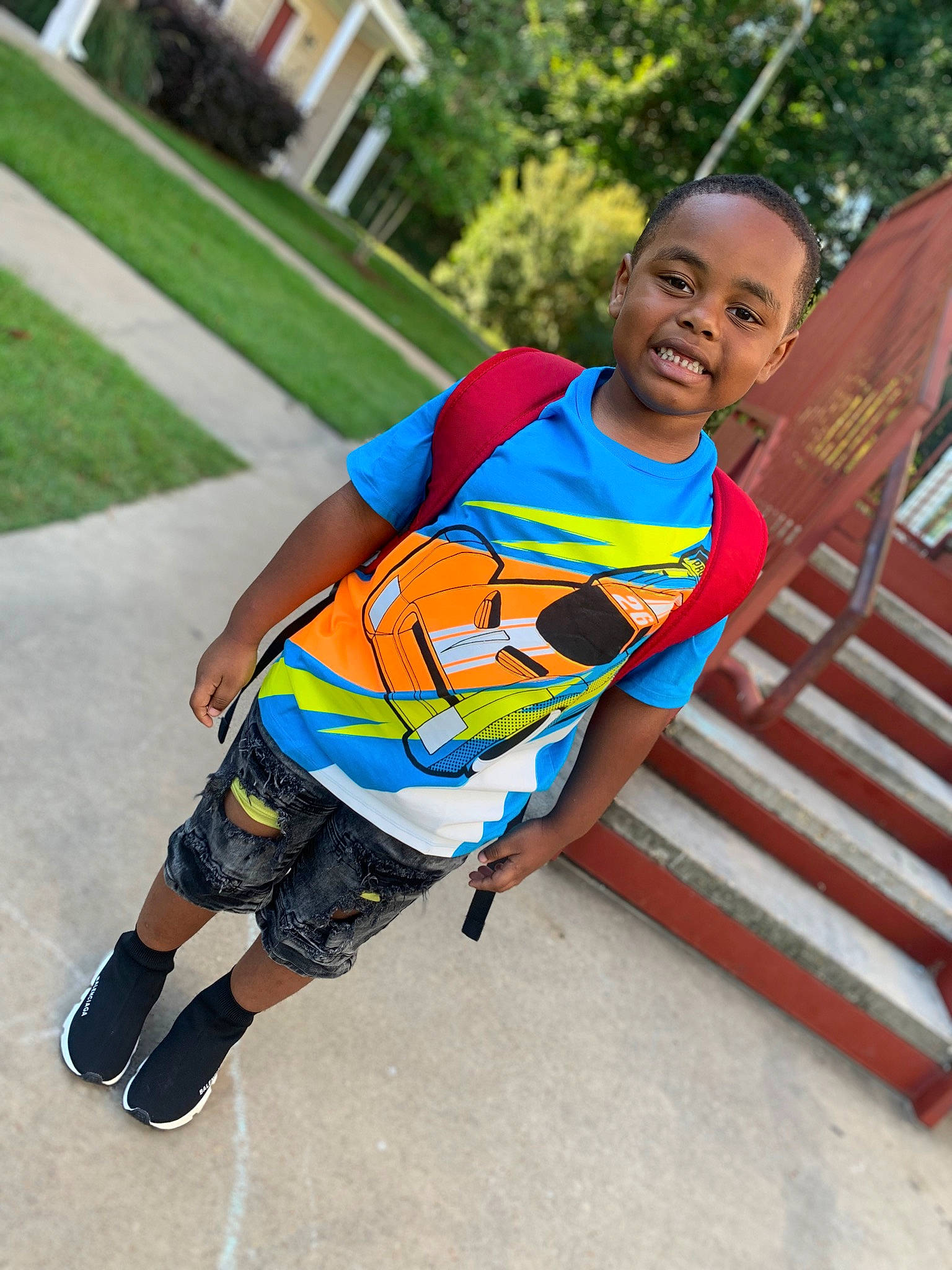 Makhi joined the competition — help win amazing prizes! child, city, competition_event, electric_blue, fun, grass, happy, joy, leisure, outdoor_play_equipment, person, personal_protective_equipment, plant, recreation, sandal, shorts, sitting, smile, swing, t_shirt