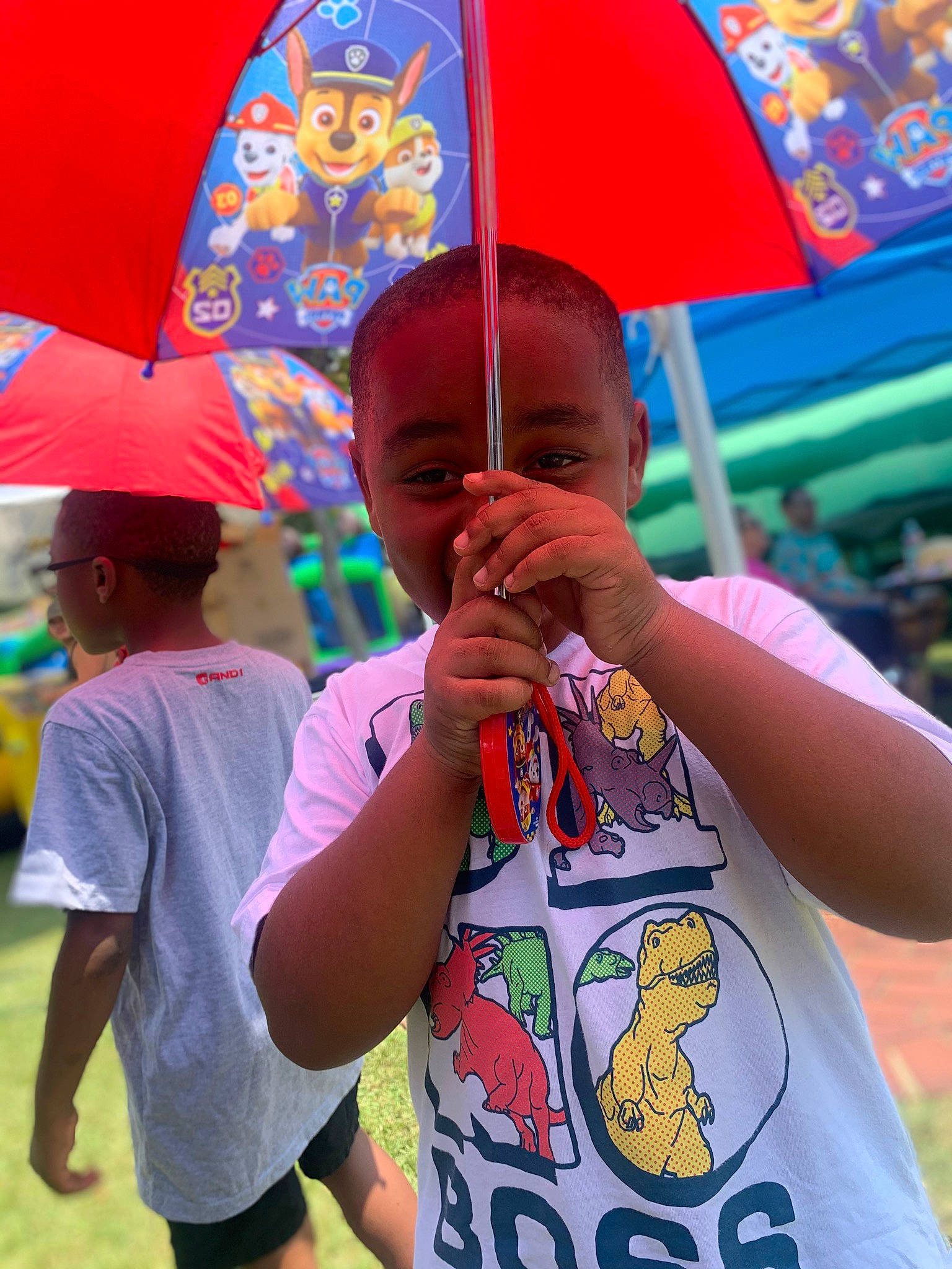 Makhi joined the competition — help win amazing prizes! community, cool, facial_expression, gesture, grass, green, hairstyle, happy, human, leaf, leisure, organ, person, pink, product, red, shorts, skin, umbrella, world