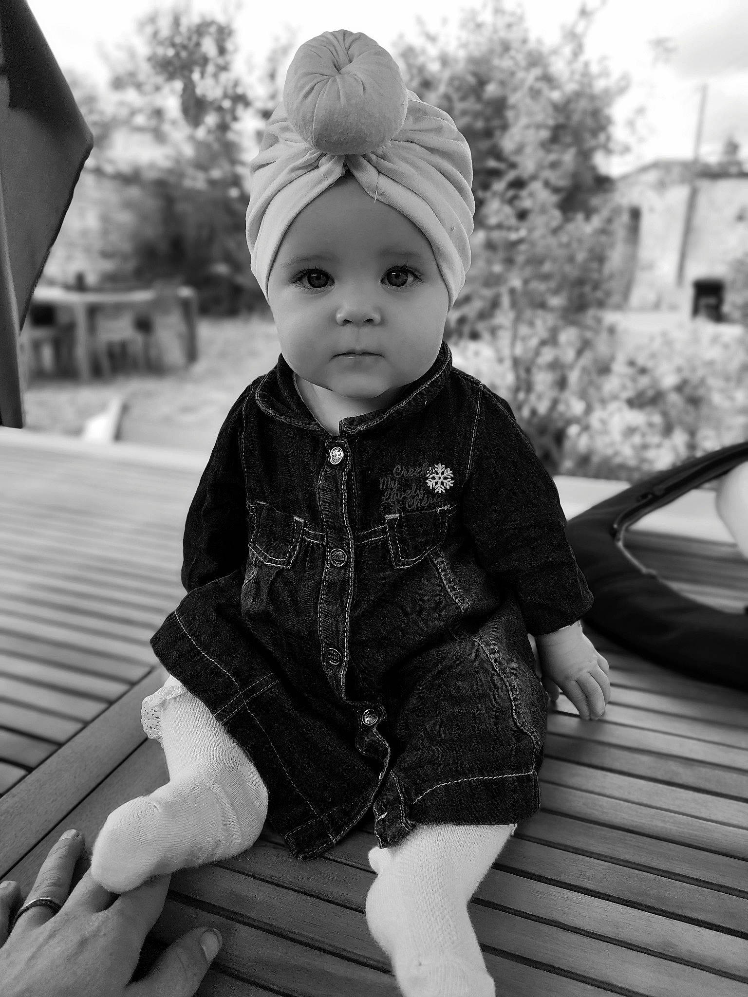 Nayana participe au concours pour gagner de l'argent avec cette photo : baby, baby_toddler_clothing, black, black_and_white, cap, cheek, child, flash_photography, grass, happy, headwear, monochrome, monochrome_photography, person, photograph, skin, sleeve, style, toddler, tree