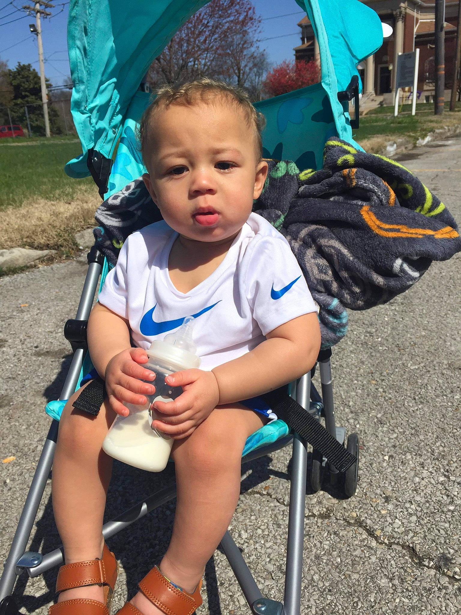 Kaius joined the competition — help win amazing prizes! baby_carriage, baby_products, blue, child, electric_blue, fun, grass, green, hairstyle, happy, leisure, person, photograph, plant, recreation, sitting, toddler, travel, tree, vacation