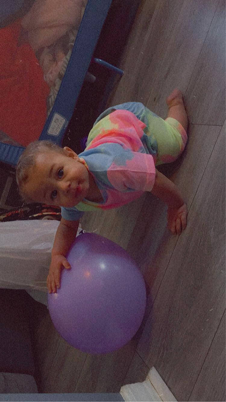 Kaius joined the competition — help win amazing prizes! baby, baby_toddler_clothing, balloon, child, flooring, foot, fun, happy, hardwood, human_leg, knee, leisure, magenta, party_supply, person, play, smile, thigh, thumb, toddler