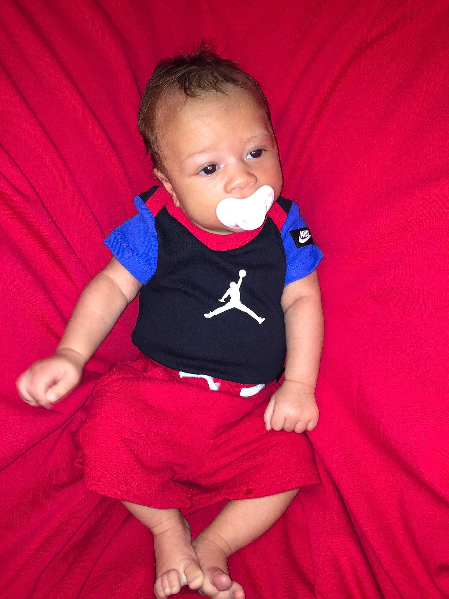 Kaius is registered to the contest to win money with this photo: baby, baby_toddler_clothing, cheek, comfort, electric_blue, finger, flash_photography, fun, hand, happy, leg, magenta, orange, person, pink, purple, red, skin, sleeve, smile